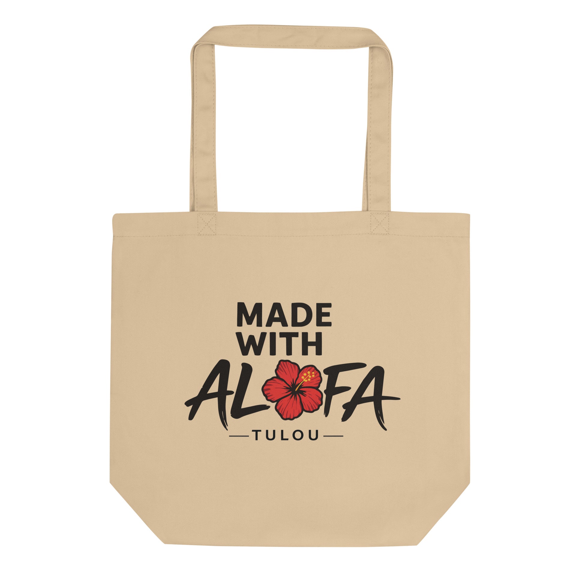 Beige tote bag with 'Made with Alofa Tulou' text and flower design on a white background
